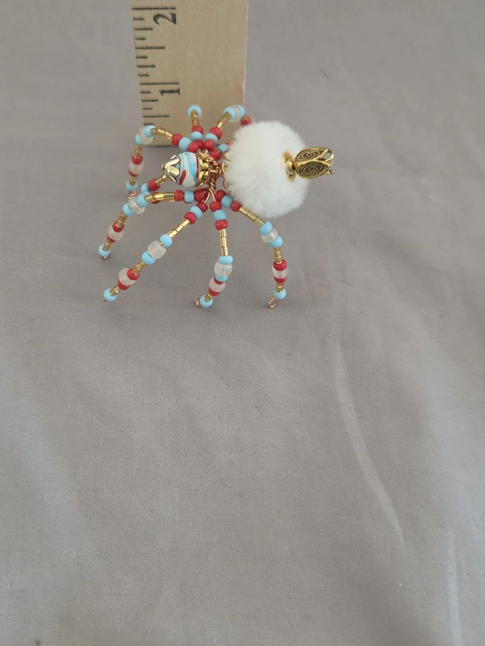 Beaded Spide with White Fur Accent